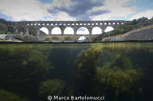 Pont du Gard - Gard River France.  The ancient roman brid... by Marco Bartolomucci 